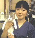 woman holding cat woman holding cat