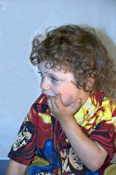 Child with fingers in mouth
